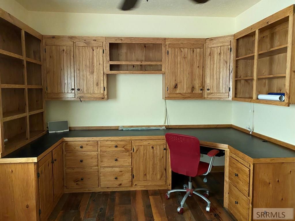 Built in desk and cabinets in office