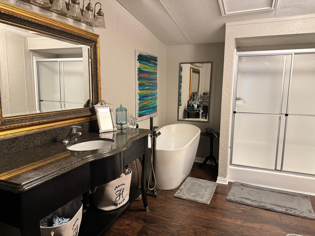 Master bath with separate tub and shower