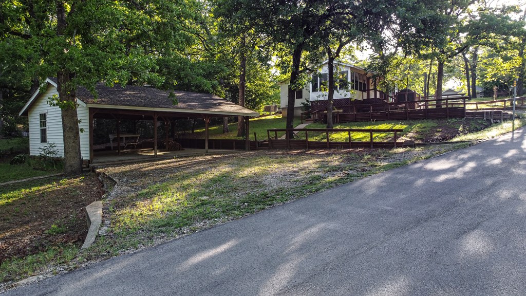 Large carport can hold 3-6 lake toys or vehicles