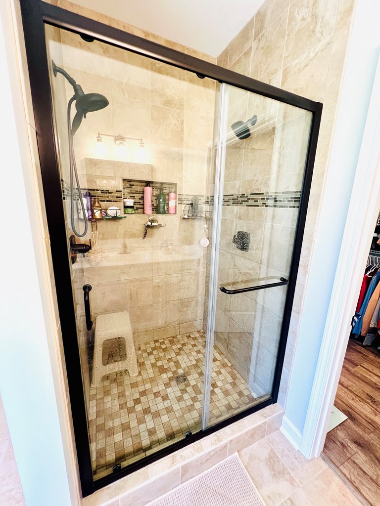 LARGE TILE SHOWER WITH GLASS DOORS
