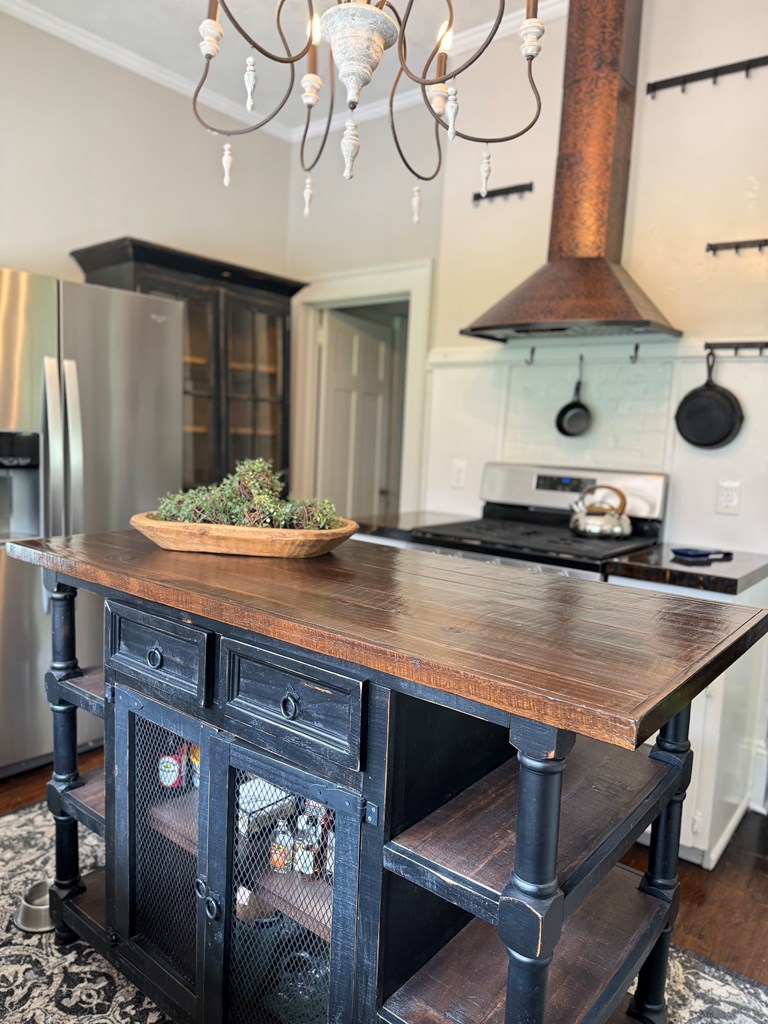 Kitchen island and copper hood