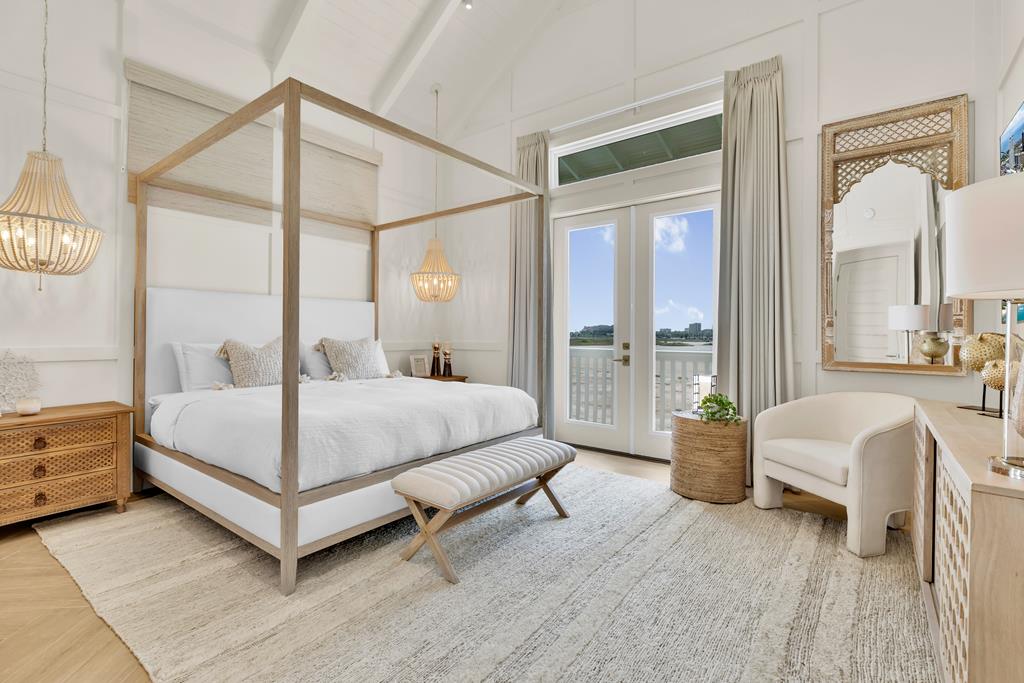 Upstairs master bedroom with partial Gulf view and