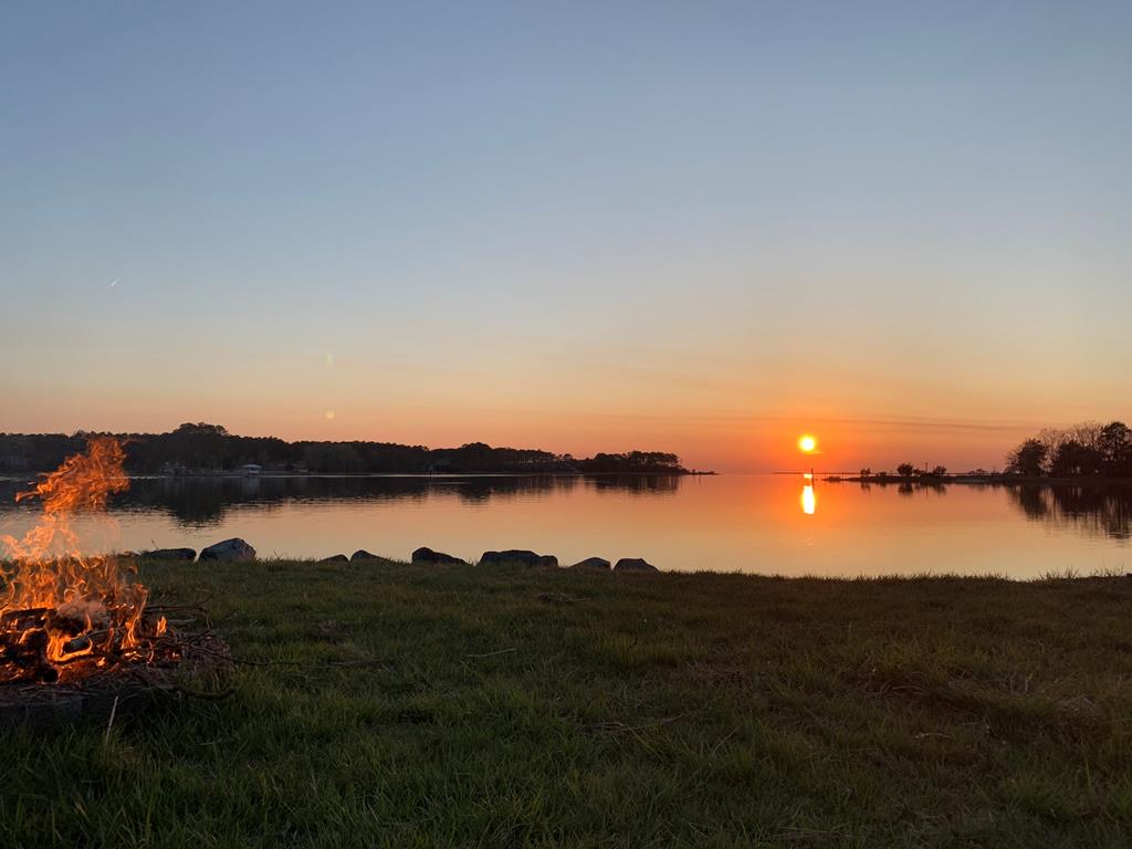 Beautiful sunset with firepit.