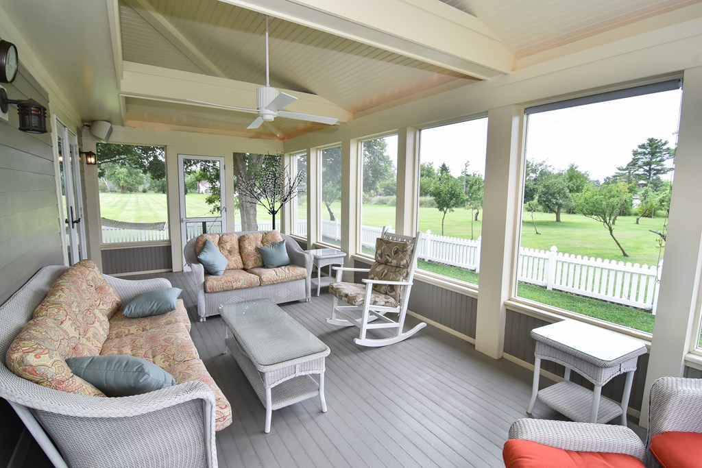 screened porch with fruit trees