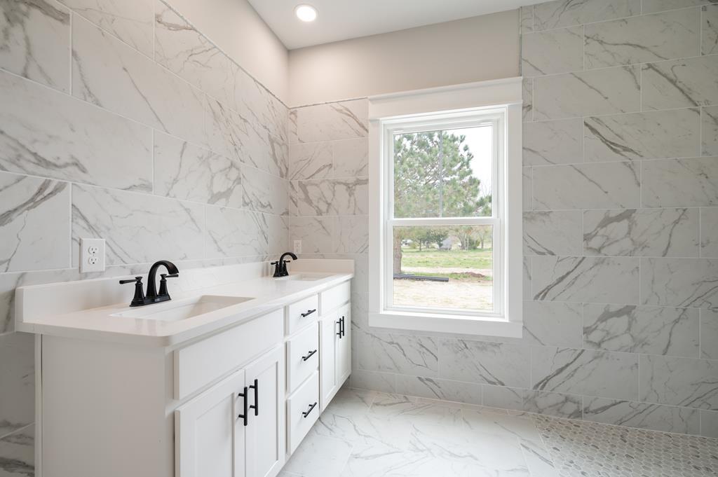 Marble Tiled Owner's Bathroom, Double Vanity Sink 