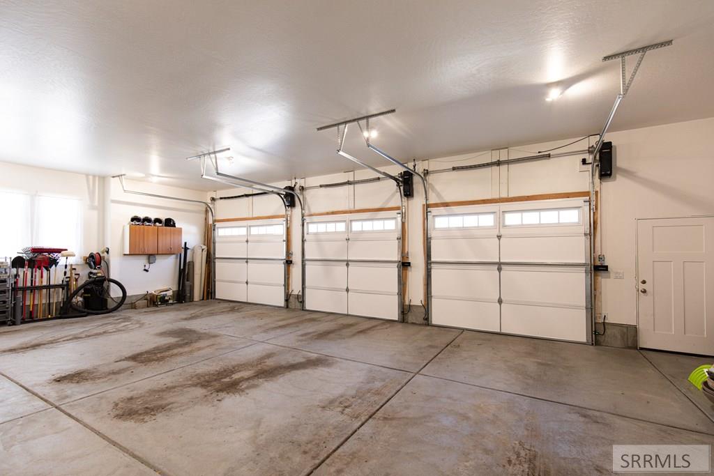 Over-sized three car garage with side openers
