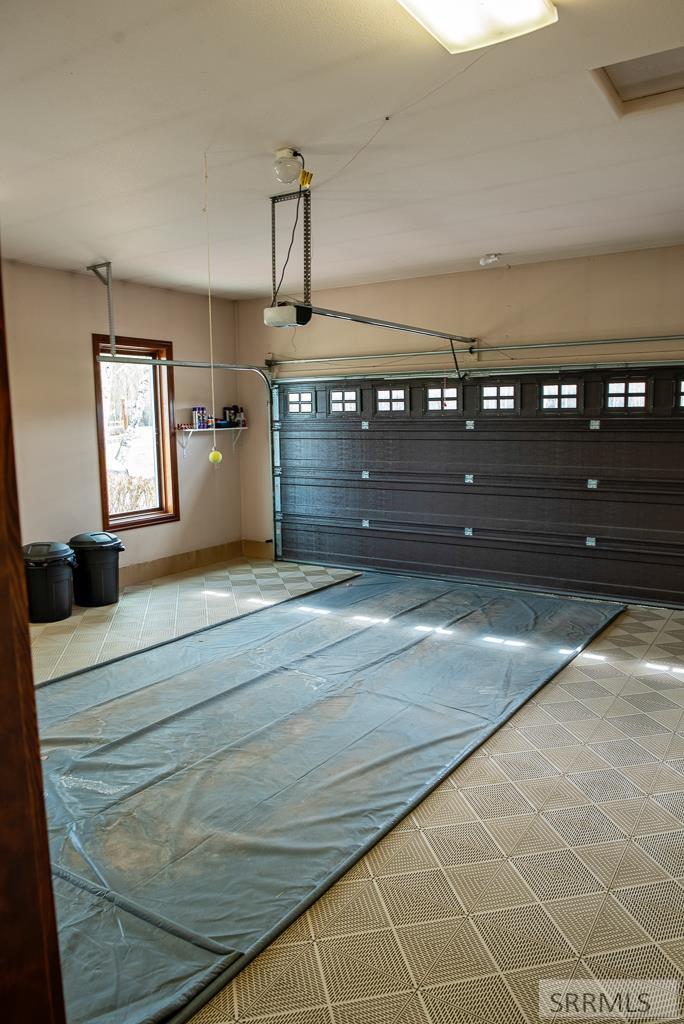 Garage with tile floor