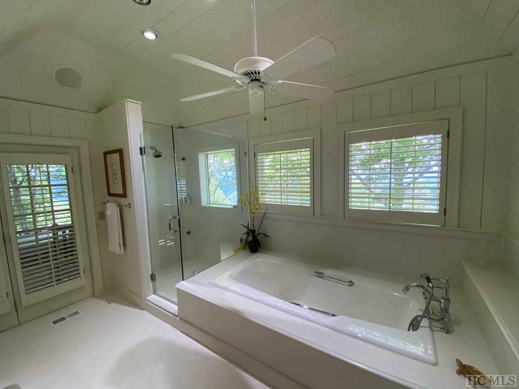 Master Bath with garden tub, and private screened 