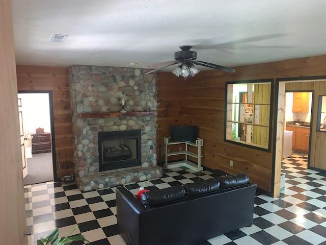Family Room In Basement With Gas Log Fireplace